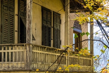 wooden balcony of a abandoned old house