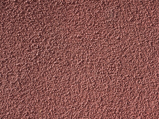 red plaster wall background