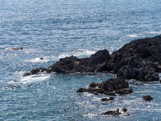Rocks, sea water, seaside landscape, rock formation on sea.