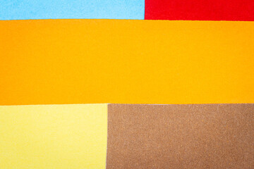 Multicolor background from a paper of different colors