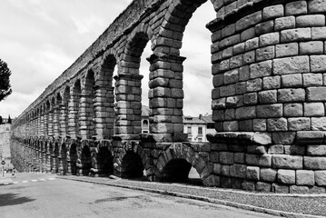 Segovia, España. April 28, 2022: Segovia aqueduct and blue sky.