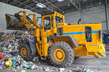 Wheel loader working in landfill.