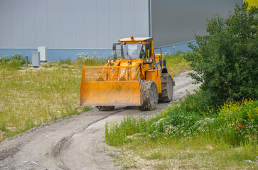Compactor working in landfill.