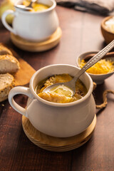 homemade onion soup on a wooden table