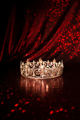 Royal luxury crown on red background. Princess and queen.