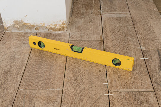 Carpenter level placed on floor