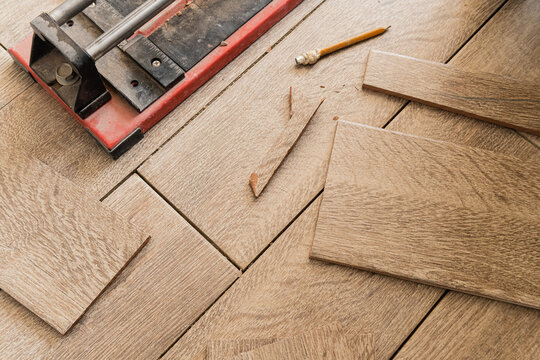 Tile saw placed on floor