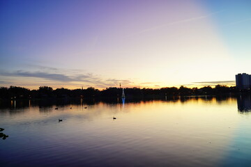 Fototapeta na wymiar Sunset landscape Lake Morton at city center of lakeland Florida 