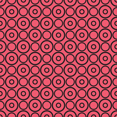 Obraz na płótnie Canvas Seamless vector pattern with black polka dots on a sweet pastel pink background