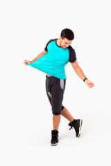 Fototapeta premium Happy fitness instructor. Happy zumba instructor. Male fitness model.