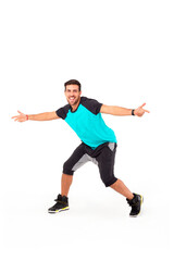 Fototapeta na wymiar Happy fitness instructor. Happy zumba instructor. Male fitness model.