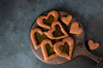 Baked cookies-hearts. Heart cookies with caramel. Valentines day dessert. Woman's day dessert. Mother day dessert.