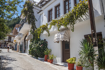 Typical narrow Greek streets and architecture with country side houses style in small village named Potamia at Thasos island, South-East from Thessaloniki 