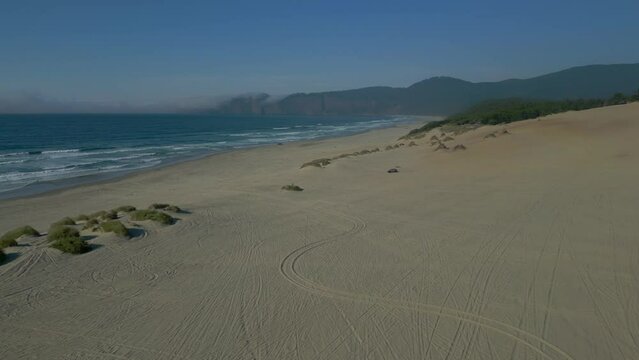 Aerial Shot of dune buggy on Sand Lake | Oregon Coast