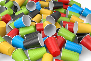 Heap of pastic disposable party cup for juice, fresh, beer on white background.
