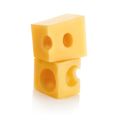 Close-up of two delicious cheese cubes, isolated on white background