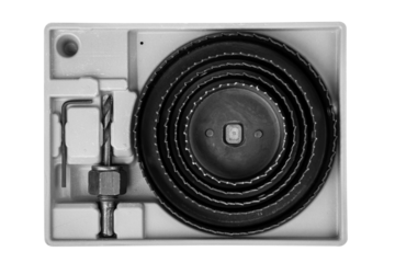 Hole saws - nozzle on a drill. Hole saw set isolated on white