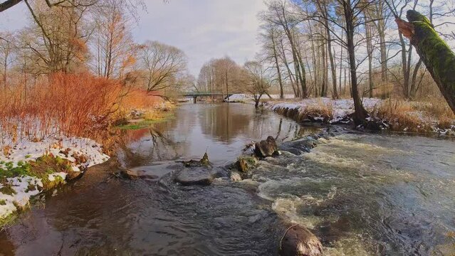 First days of winter on a small river, Poland.