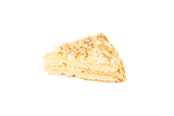 Slice of creamy Swedish almond cake with toasted almond flakes on a white background.