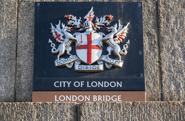 A dragon sculpture on London Bridge in London, UK. There are various dragon statue boundary markers that mark the boundaries of the City of London.