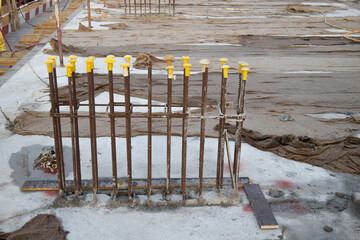 column reinforcement starter bars in a construction site