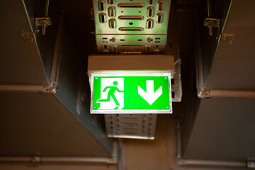 Emergency exit sign over doors.