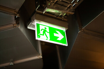 Emergency exit sign over doors.