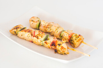 turkey skewer with pepper and  condiment