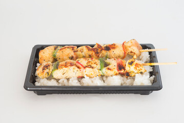 turkey skewer and rice condiment