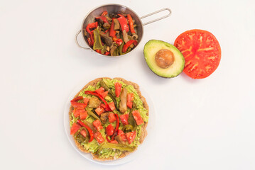 Fajitas with tortilla mix tomato, pepper, tuna onion and avocado on white background