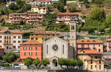 View on the Holy Trinity Church situated in Argegno village  on the shore of Lake Como, Lombardy,...