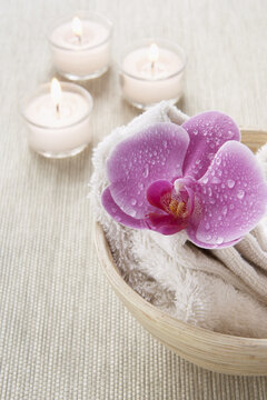 Orchid, Towels and Candles