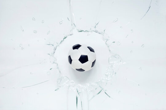 Soccer Ball and Broken Glass
