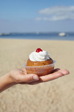 Woman Holding Cake, Andernos-les-Bains, Arcachon, Gironde, Aquitaine, France