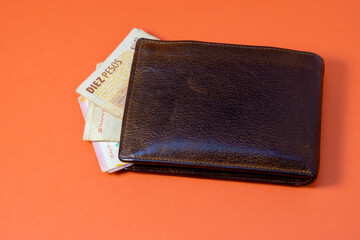 Leather wallet with money in cash