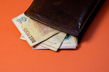 Leather wallet with money in cash