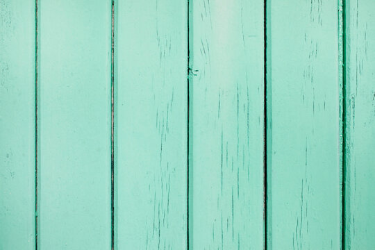 Close-up of turquoise, painted, wooden wall, France