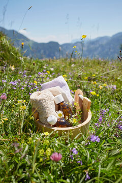 Bucket with Homeopathic Medicine in Flower Field, Strobl, Salzburger Land, Austria