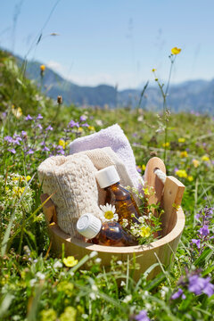 Bucket with Homeopathic Medicine in Flower Field, Strobl, Salzburger Land, Austria