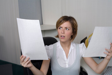 Businesswoman Looking at Documents