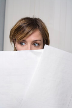 Businesswoman Looking at Documents