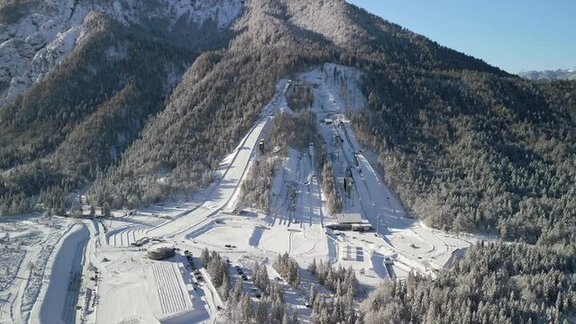 Ski Jump in Planica near Kranjska Gora Slovenia covered in snow at winter time, aerial view.