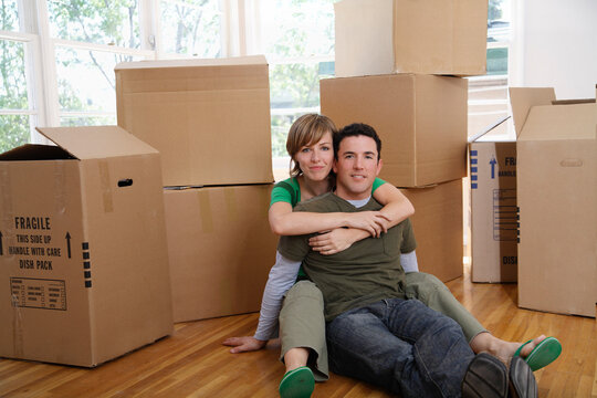 Couple Moving Into New Home