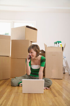 Woman Moving Into New Home