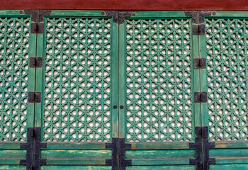 Green wooden facade of the Gyeongbokgung palace in Seoul, South Korea, Asia