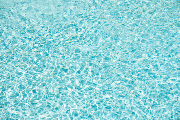 blue color background of swimming pool water with ripples in maldives