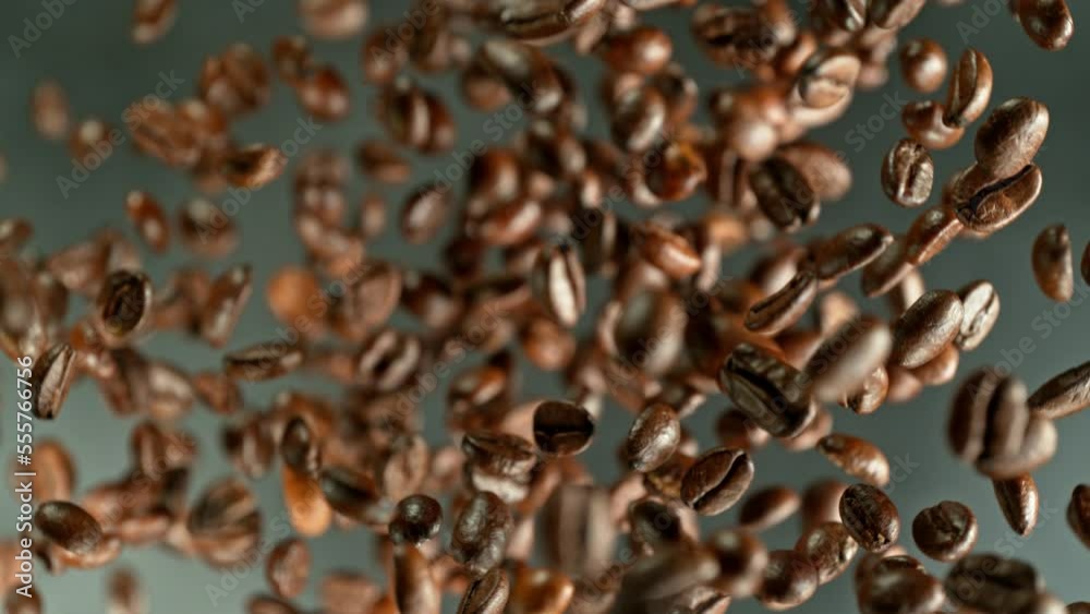 Aufkleber super slow motion of rotating coffee beans on black background. filmed on high speed cinema camera, 
