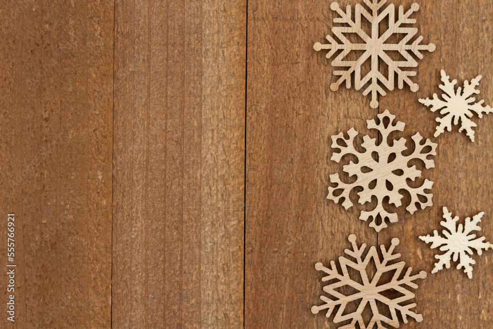 Canvas Prints wood snowflakes on weathered wood holiday background