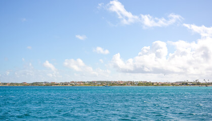Fototapeta premium A beautiful coastal view on Aruba island from Caribbean sea. Space for text. 