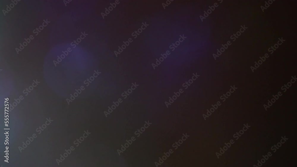 Wall mural smooth light leaks motion with bokeh fading. studio lens flare effect. blue light leaks 4k footage o